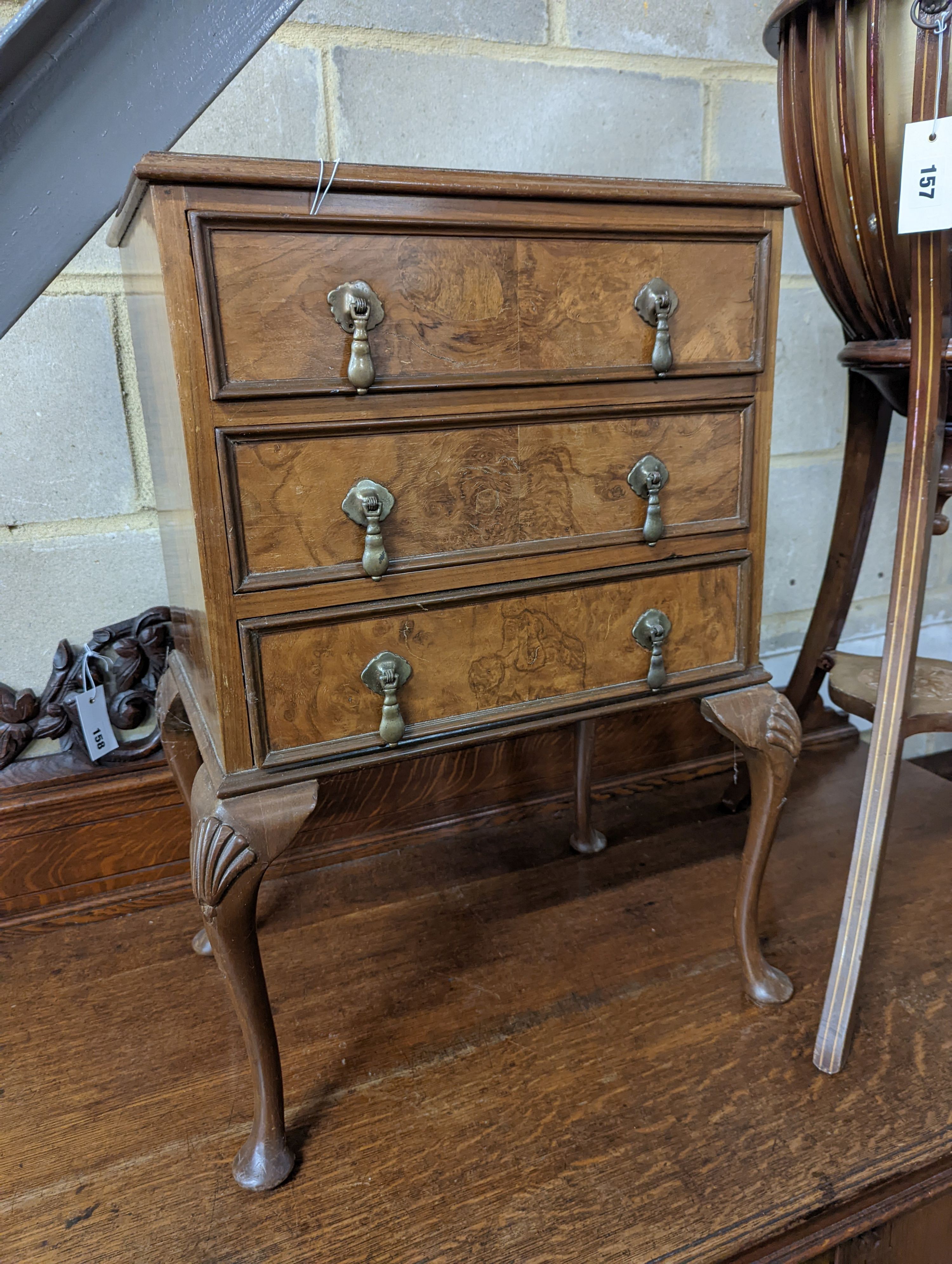 A small Queen Anne revival walnut three drawer chest, width 49cm, depth 35cm, height 69cm